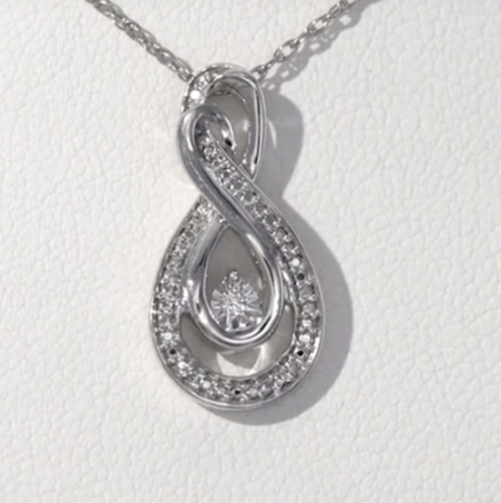 Diamond accent looped infinity pendant